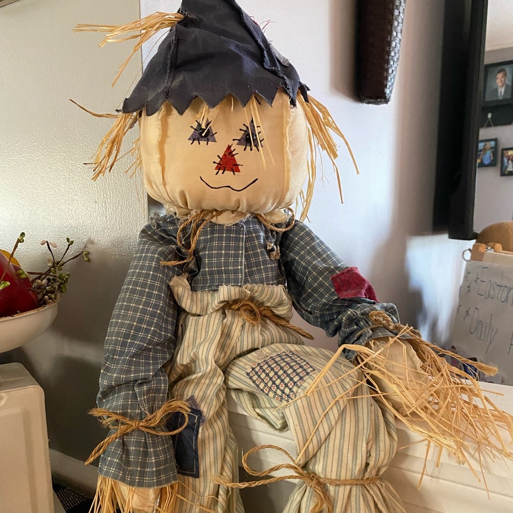 Handmade scarecrow with hat